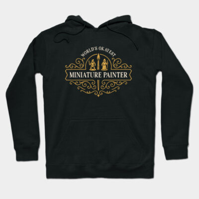 Black hoodie with "World's Okayest Miniature Painter" gold print, casual style, perfect for comfortable wear.