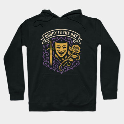 Black hoodie with "Agony is the Art" design, featuring a mask, sword, and rose in purple and gold. Casual wear.