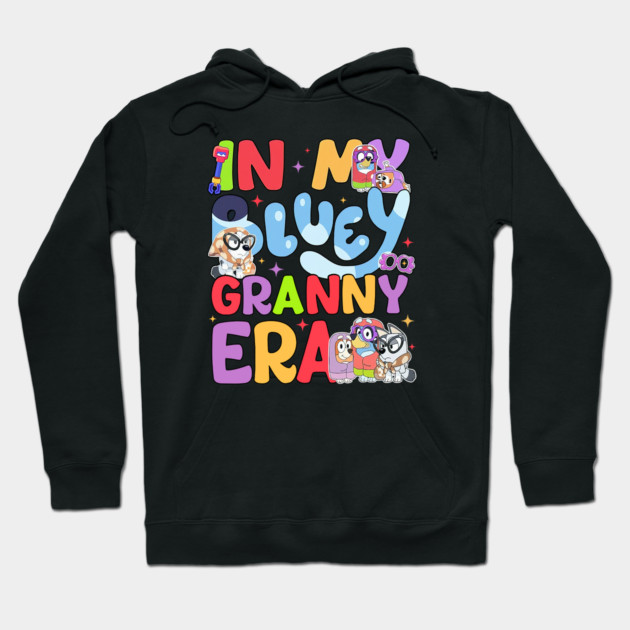 Black hoodie with colorful "In My Bluey Granny Era" graphic, featuring playful cartoon characters, perfect for casual wear.