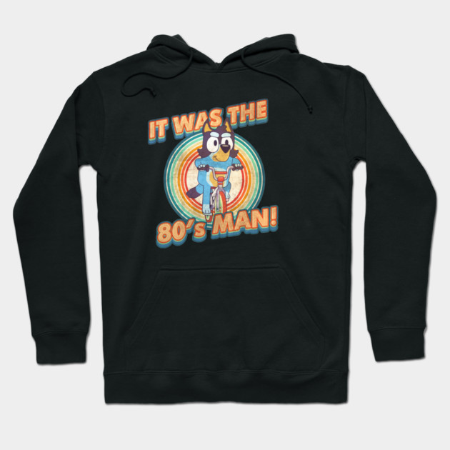 Black retro-themed hoodie with cartoon graphic and "It Was the 80's Man" text, perfect for casual wear.