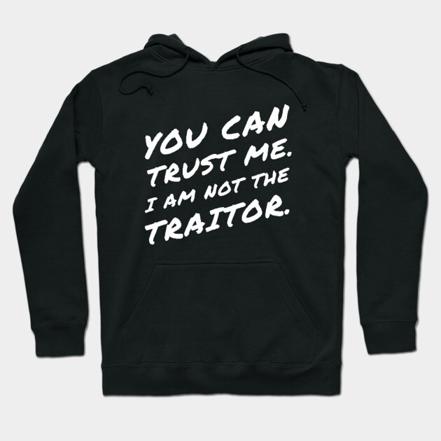 Black hoodie with bold white text reading "You Can Trust Me. I Am Not The Traitor" for casual wear.
