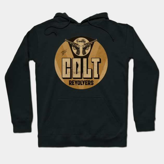 Black hoodie with vintage Colt revolvers graphic, cozy cotton material, perfect for casual wear.