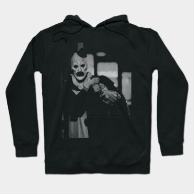 "Black hoodie featuring a vintage clown graphic, cozy cotton material, perfect for casual wear or Halloween occasions."