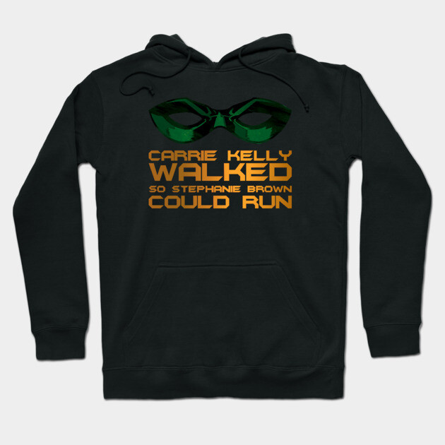 Black hoodie with graphic and text design, featuring green and orange colors, casual style, cotton material.
