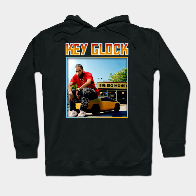 Black hoodie with vibrant graphic design, featuring a car and text, casual style, ideal for everyday wear.