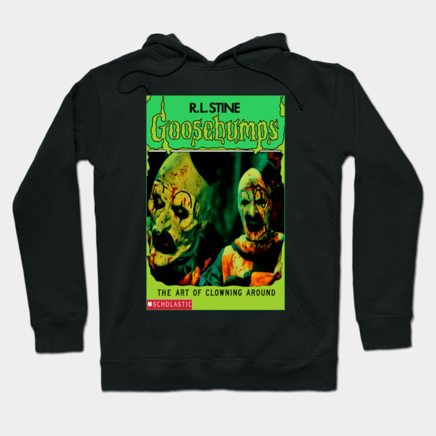 Black Goosebumps hoodie featuring creepy clown design, perfect for horror fans. Cozy and stylish for casual wear.