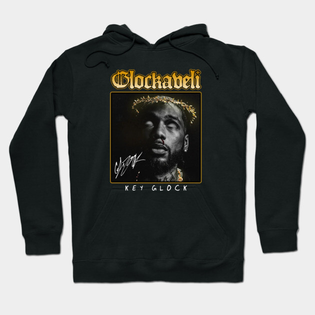 Black hoodie with graphic print and text design, featuring adjustable drawstrings, ideal for casual wear.