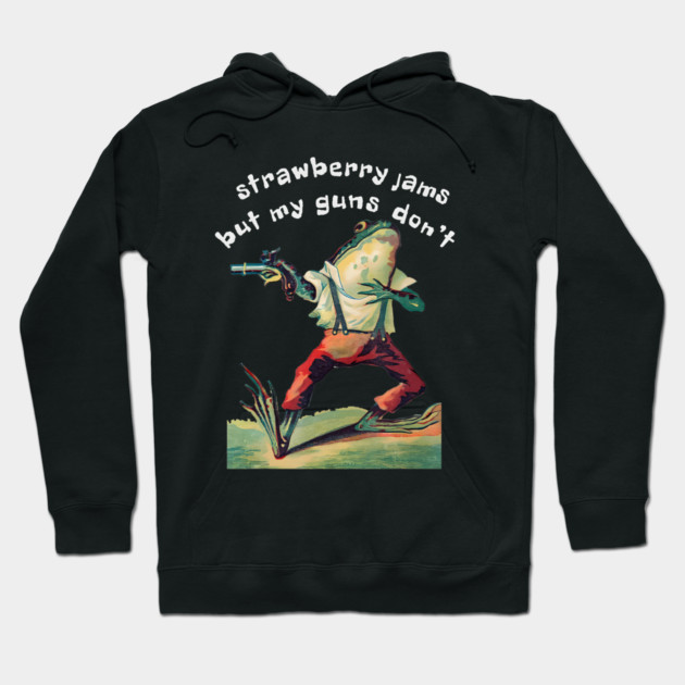 Black hoodie with quirky graphic and text "strawberry jams but my guns don't," featuring a unique retro design.