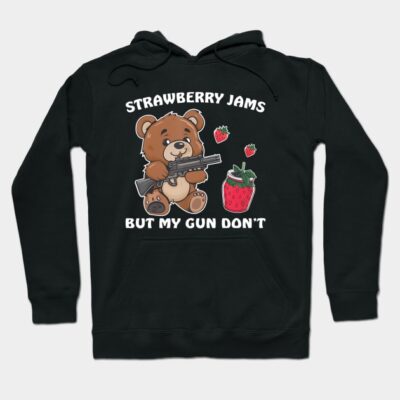 Black hoodie with cute bear and strawberry design, text "Strawberry Jams But My Gun Don't", casual wear.