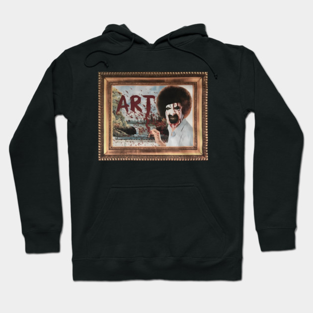 Black hoodie with painted art design, featuring bold text and creative illustration. Perfect for casual wear.