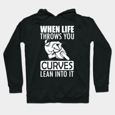 Black hoodie with white text "When Life Throws You Curves, Lean Into It," featuring a motorcycle graphic. Casual wear.