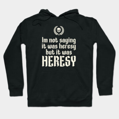 Black hoodie with bold white text "Heresy" and skull emblem, casual style, cotton blend for comfortable wear.