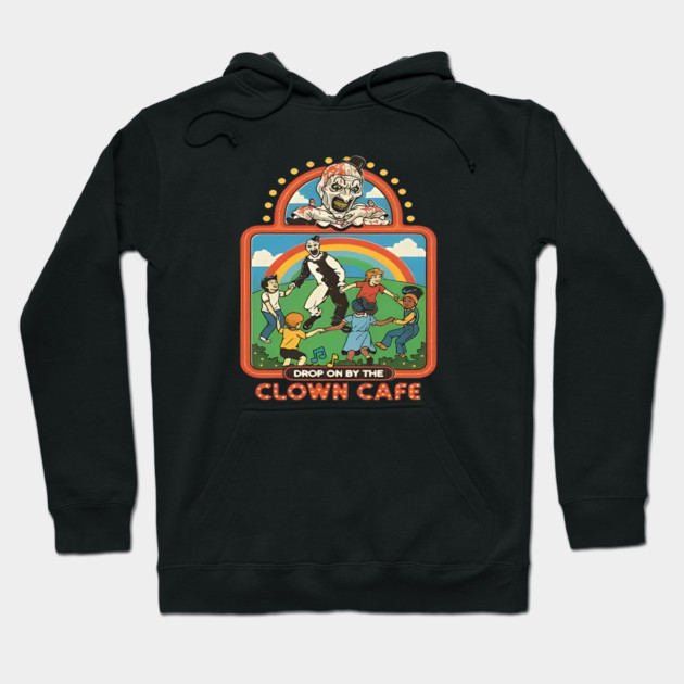 Black graphic hoodie featuring retro "Clown Cafe" design with vibrant colors, ideal for casual wear and comfort.