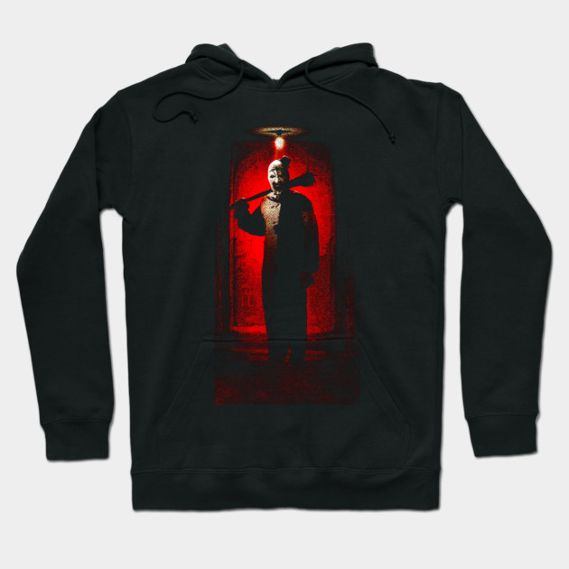 Black hoodie with bold red graphic design, featuring a dramatic silhouette. Cozy cotton material, perfect for cool weather.