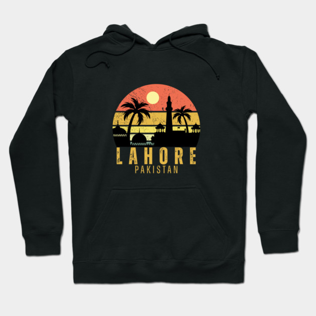 Black hoodie with Lahore Pakistan sunset design, featuring palm trees and a silhouette, perfect for casual wear.