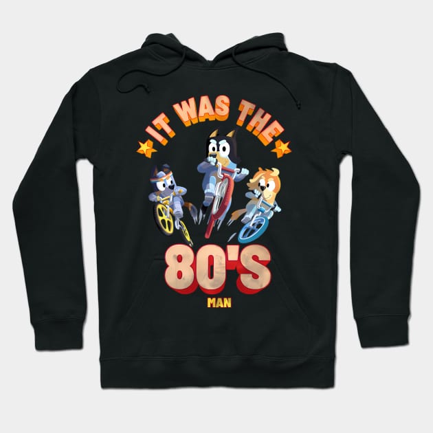 Black hoodie featuring retro-themed "It Was the 80's Man" graphic with cartoon characters on bikes, casual wear.