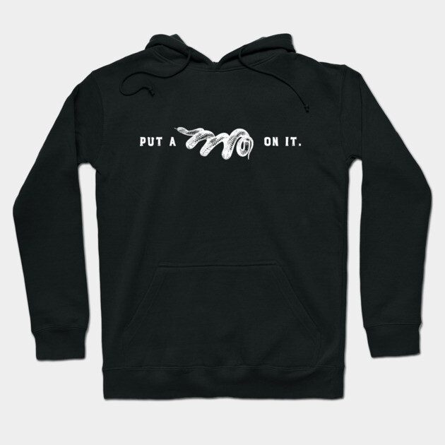 Black hoodie with "Put a Spell on It" text and snake graphic, casual style, cotton blend, unisex design.
