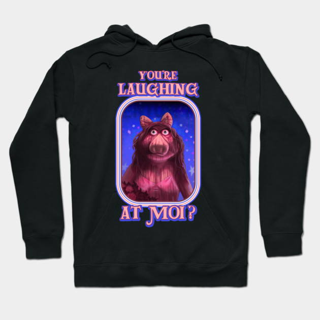 Black hoodie with humorous pink graphic and "You're Laughing at Moi?" text, casual wear, cotton blend material.