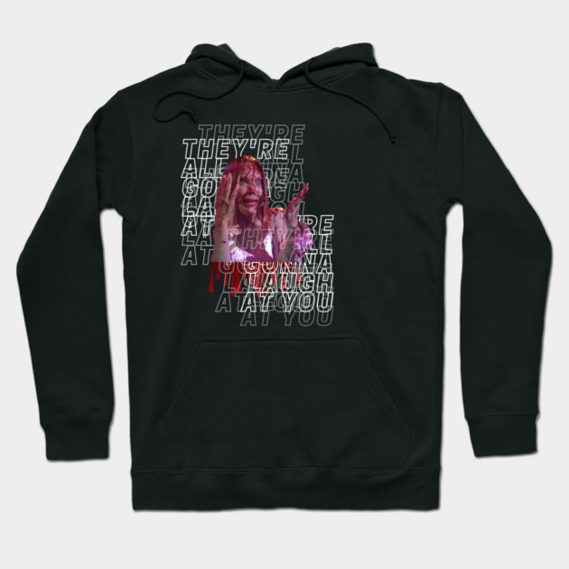 Black graphic hoodie with horror-themed design and text overlay, made of cotton, perfect for casual wear and fans of edgy styles.