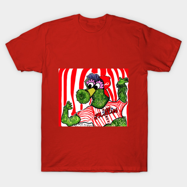 Red T-shirt with colorful cartoon design, featuring a green mascot in a striped jersey. Casual wear, cotton material.