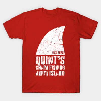 Red graphic t-shirt featuring white shark fin design and "Quint's Shark Fishing Amity Island" text, casual cotton wear.