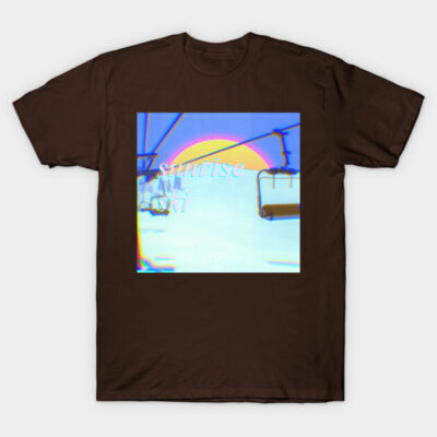 Brown t-shirt with "Sunrise Ski" graphic, featuring a colorful ski lift design. Ideal for casual wear and ski enthusiasts.