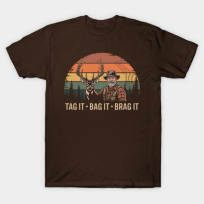 Brown hunting-themed t-shirt with vintage sunset design, featuring deer and forest graphics, cotton material, casual wear.
