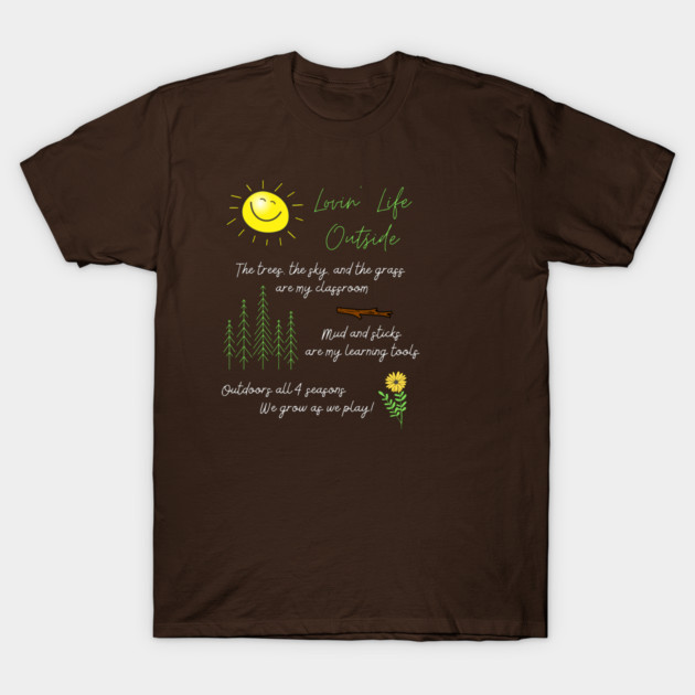 Brown t-shirt with nature-themed graphic and text, featuring a sun, trees, and plants. Casual outdoor style. Cotton material.